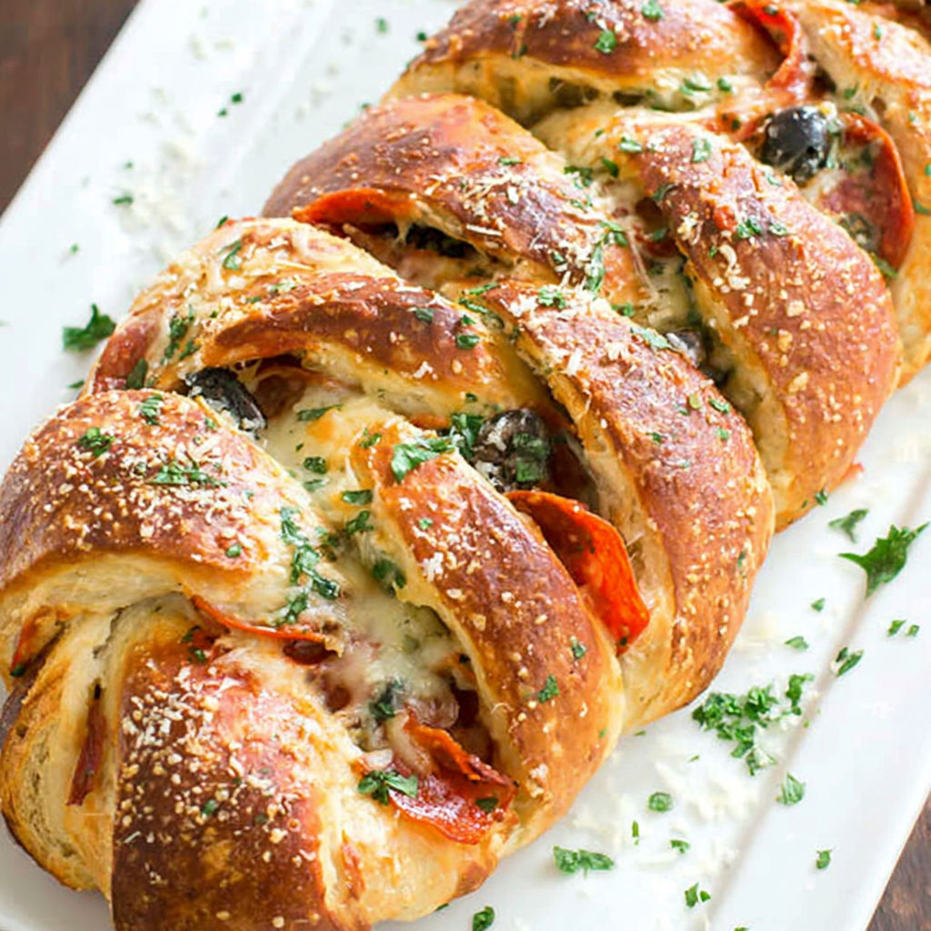 A twisted pizza with pepperoni and cheese.