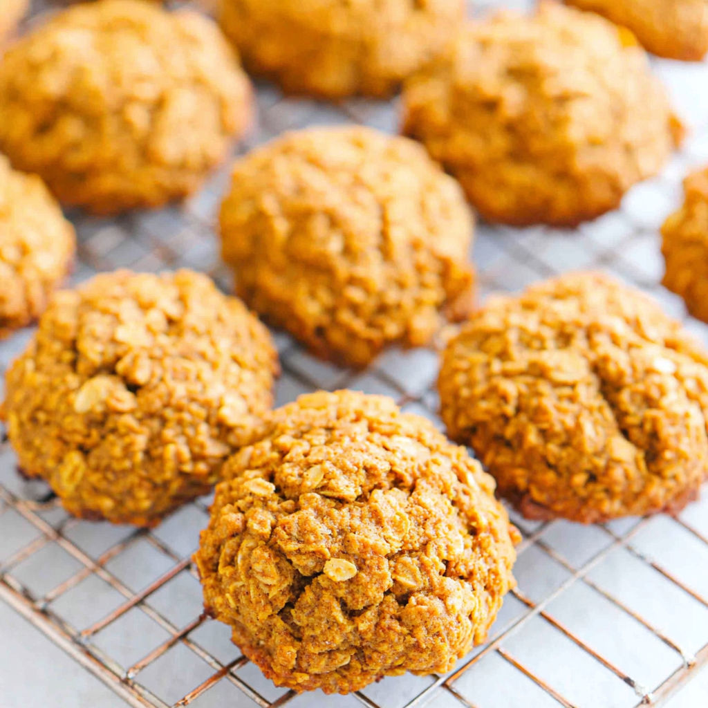 A tray of cookies with a yellowish brown color.