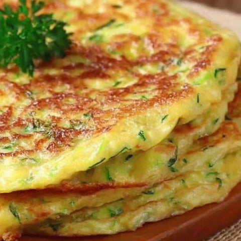 A stack of zucchini-cheese pancakes.