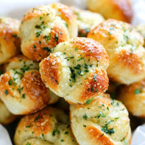 A plate of garlic parmesan knots.