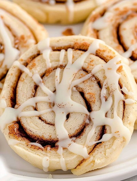 A plate of cinnamon roll cookies.