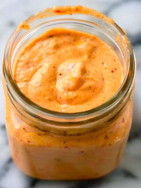 A jar of bang bang sauce.