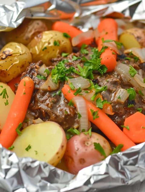 A beef and vegetable hobo dinner.
