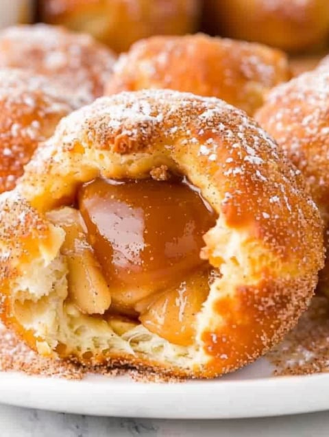 A close up of a caramel apple pie bomb.